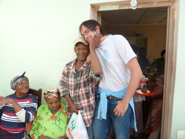Alex with community members in Somerset East, South Africa